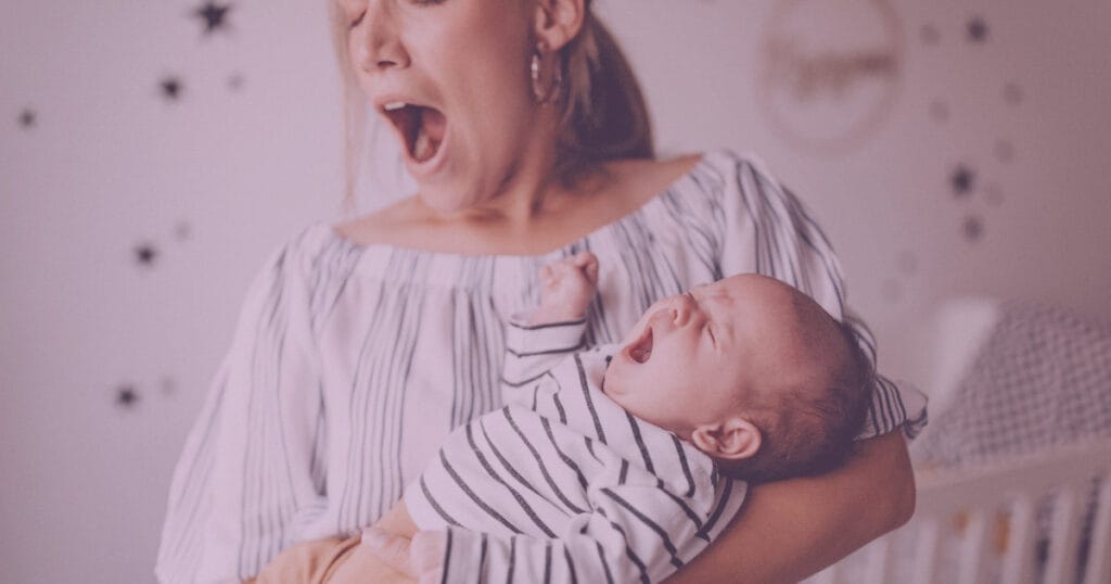yawning mom and baby 